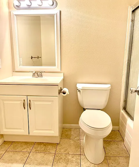 Upstairs full bathroom with shower and bathtub