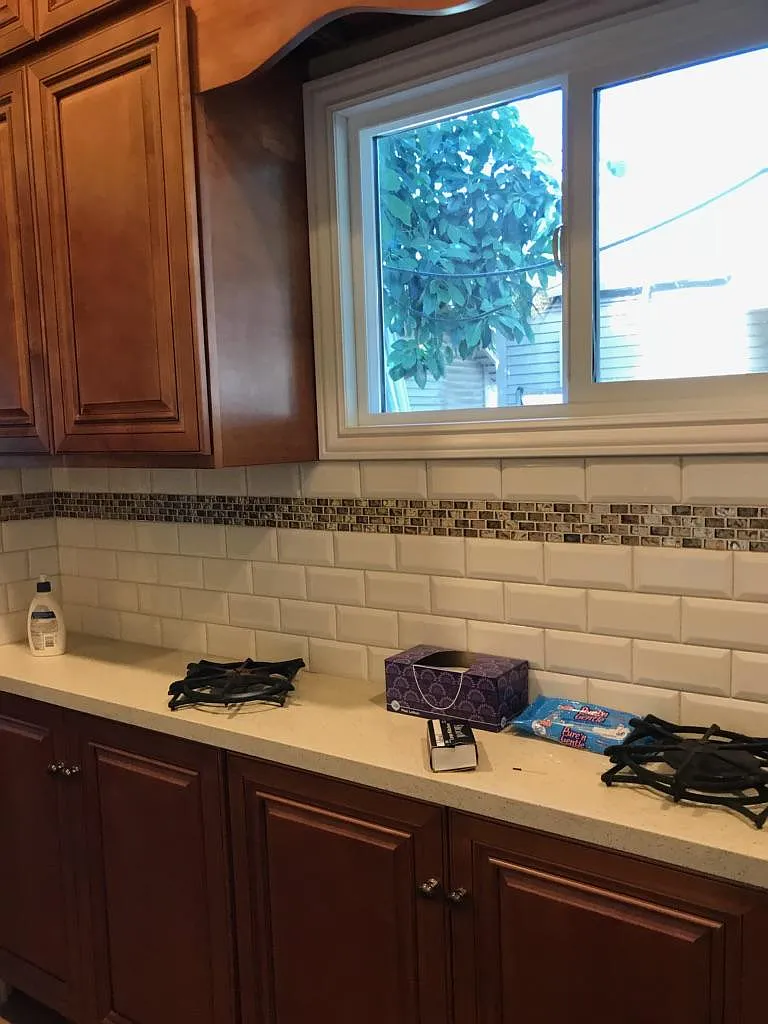 same as previous photo except for view of cabinetry all along underneath of right counter top
