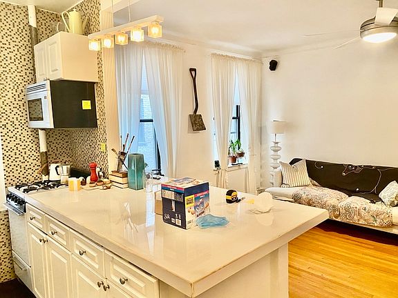 3rd image of 415 W 24th St APT 3K