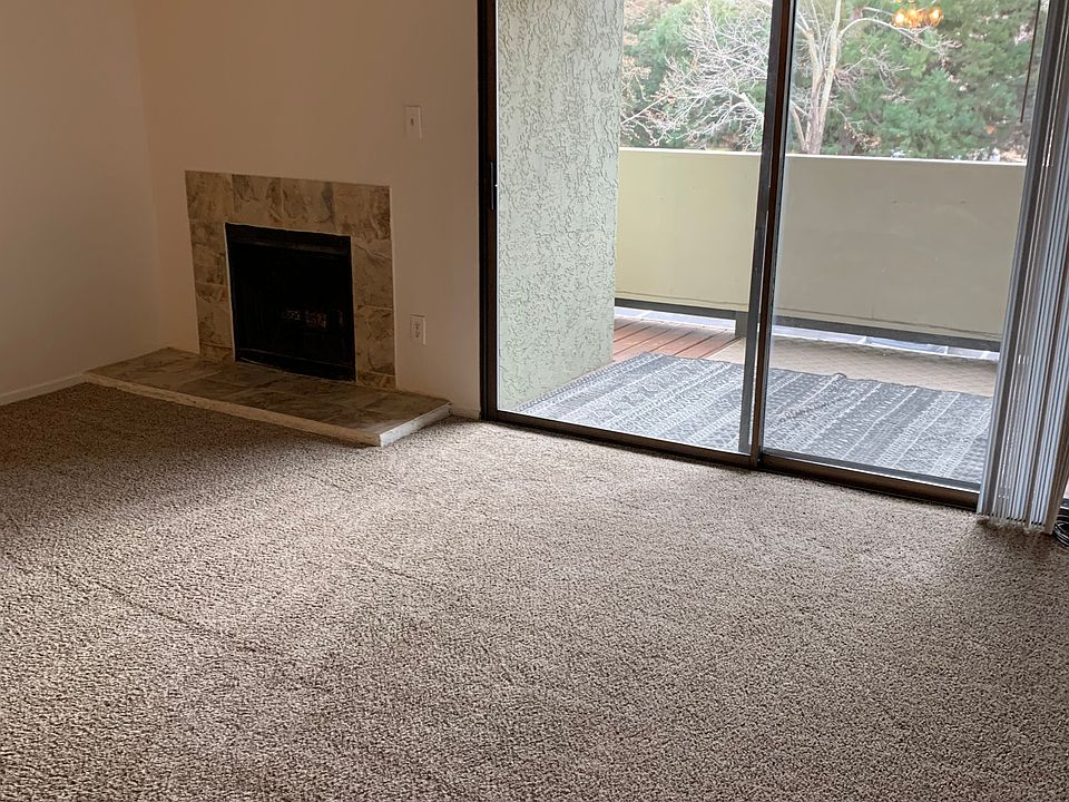 fireplace and living space near glass door