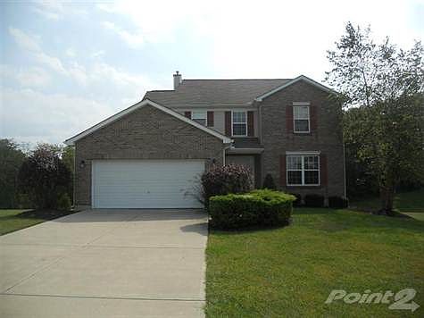 This well maintained home has great curb appeal!  Nicely landscaped and easy to keep green with the in ground sprinkler system!