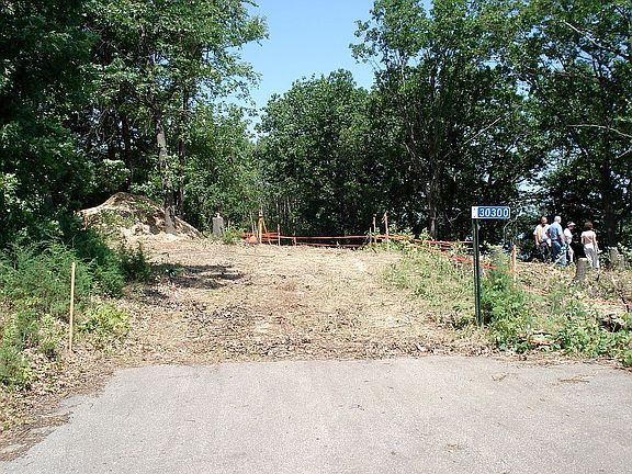 South entrance to lot.
