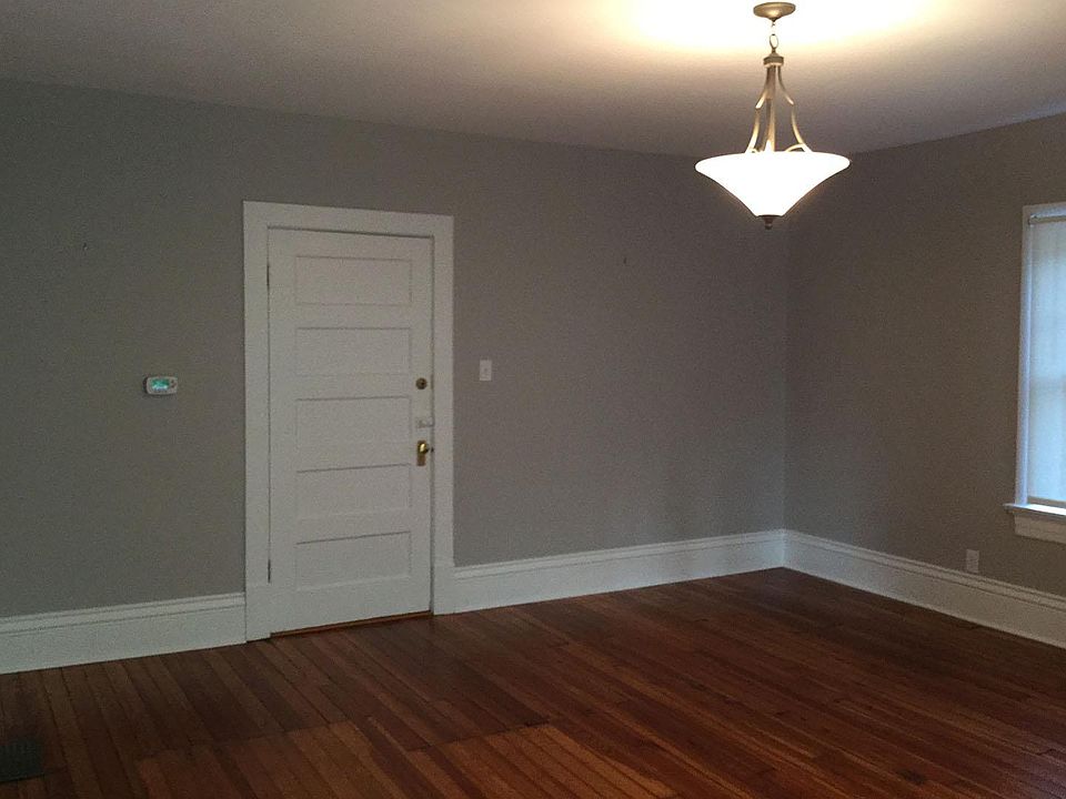 Living room and apt. entry door / upstairs hall.