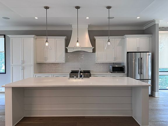 Gourmet Kitchen with big quartz Island