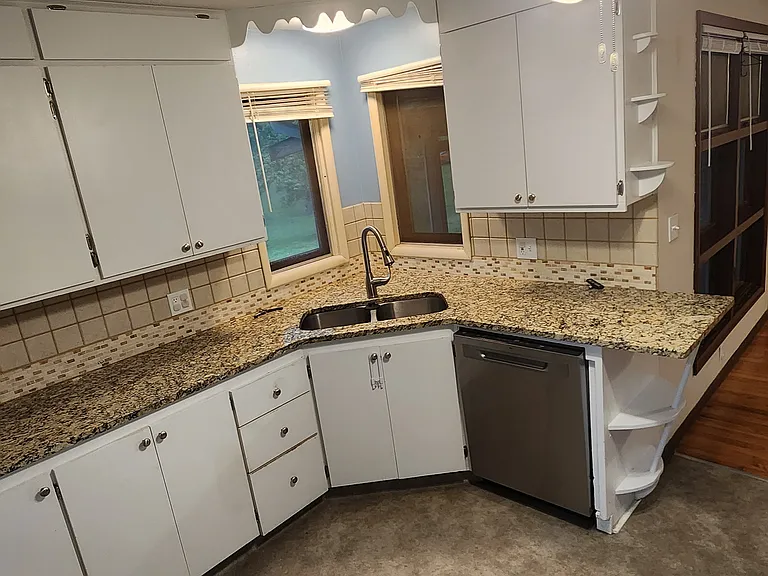9036 NW Rochester Rd — Photo 3