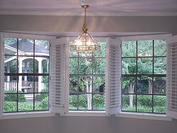 Bay window overlooks back yard