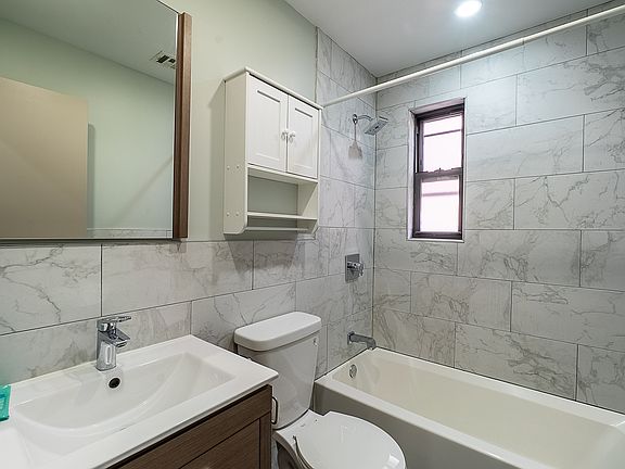 5th image of 3279 33rd St Unit 2F