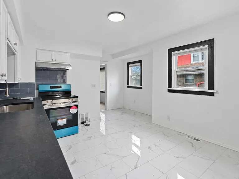 5408 Woodland Ave — Photo 22