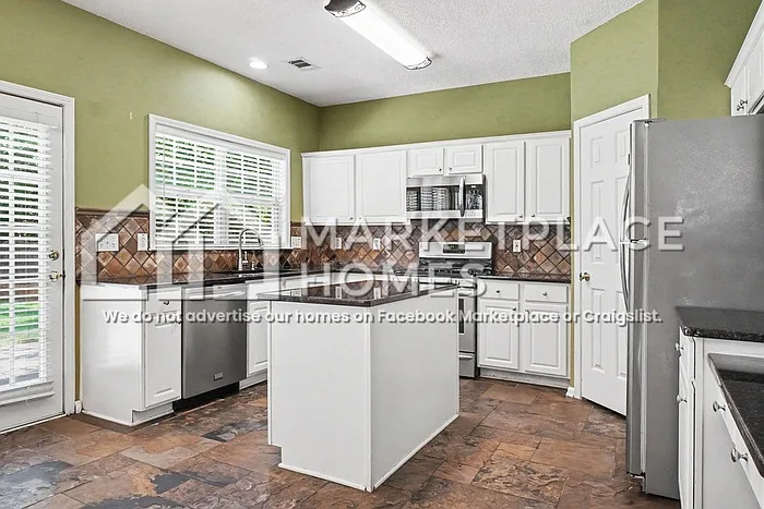 3398 Spindletop Dr NW — Photo 10