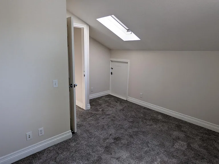 Includes a skylight in one of the bedrooms