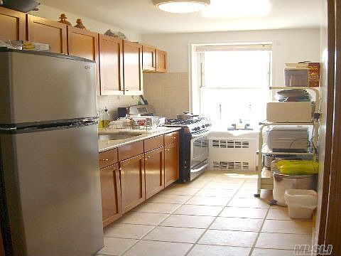 4th image of 8810 34th Ave APT 3E