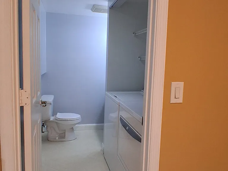 Guest half bath & laundry area