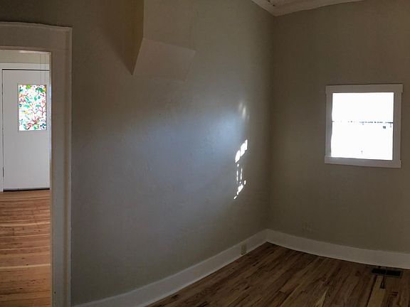 Bedroom looking into living room (wide angle view)