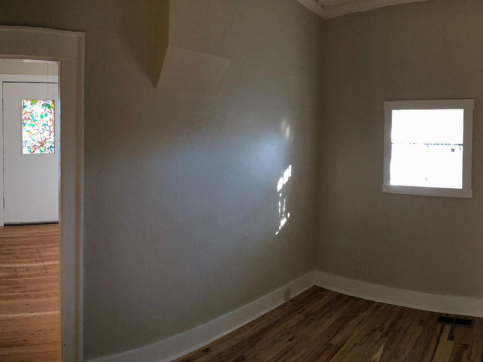 Bedroom looking into living room (wide angle view)