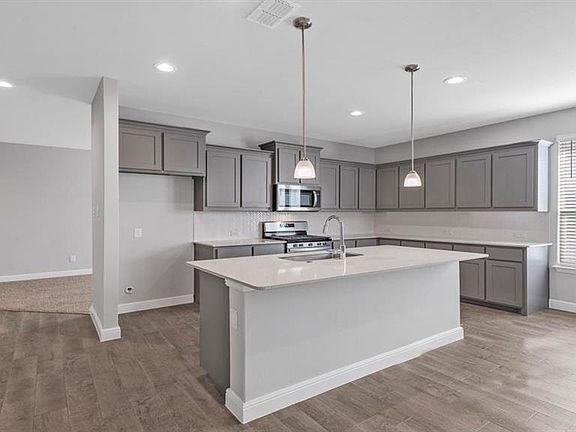 Photos shown here may not depict the specified home & features included are for illustration purposes only