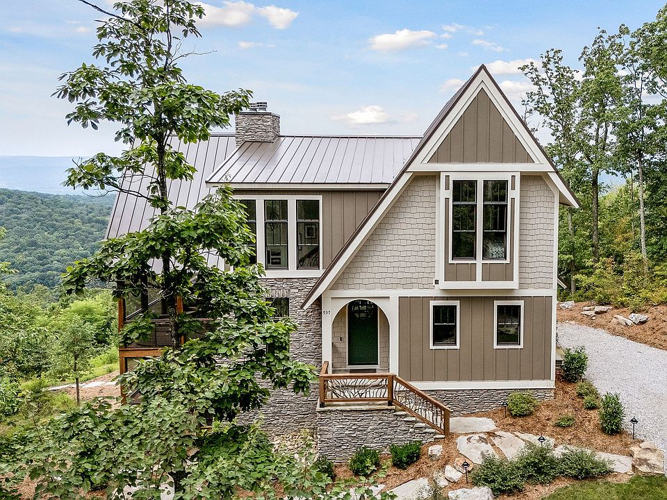 洋書 Mountain Houses Mummy Mountain estate with giant granite rock inside listed