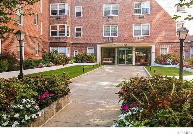 Newly grassed and landscaped sunny entrance