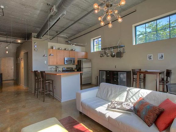Wide view of Living, Dining, & Kitchen