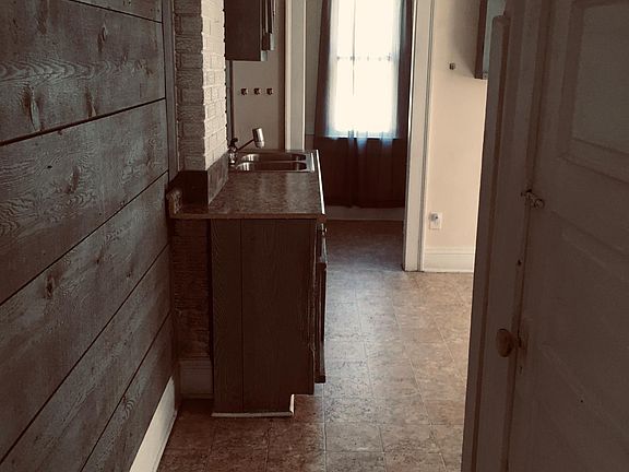walking into the kitchen