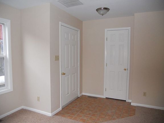 tiled entry with closet