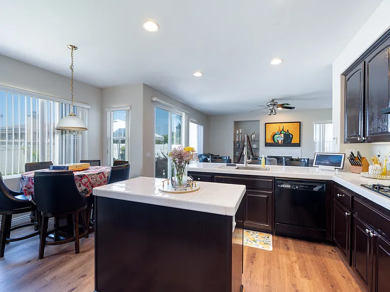 Kitchen, breakfast nook, family room from formal dining room entrance