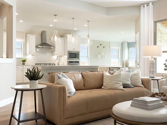 Open-Concept Gathering Room with Backyard Patio Views