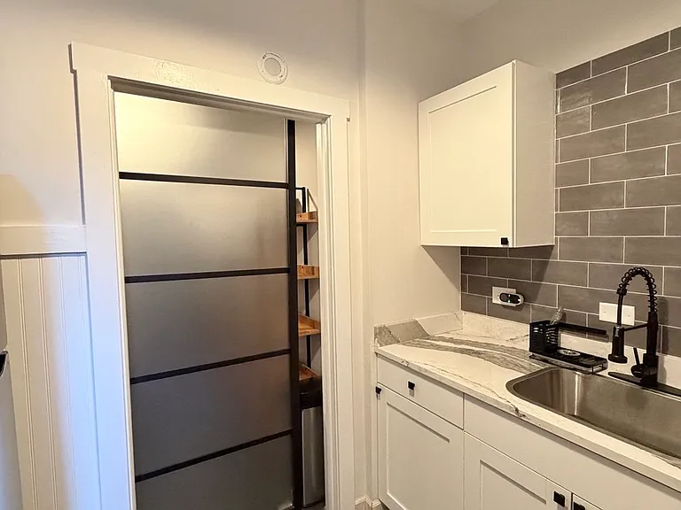 Kitchen with den door closed