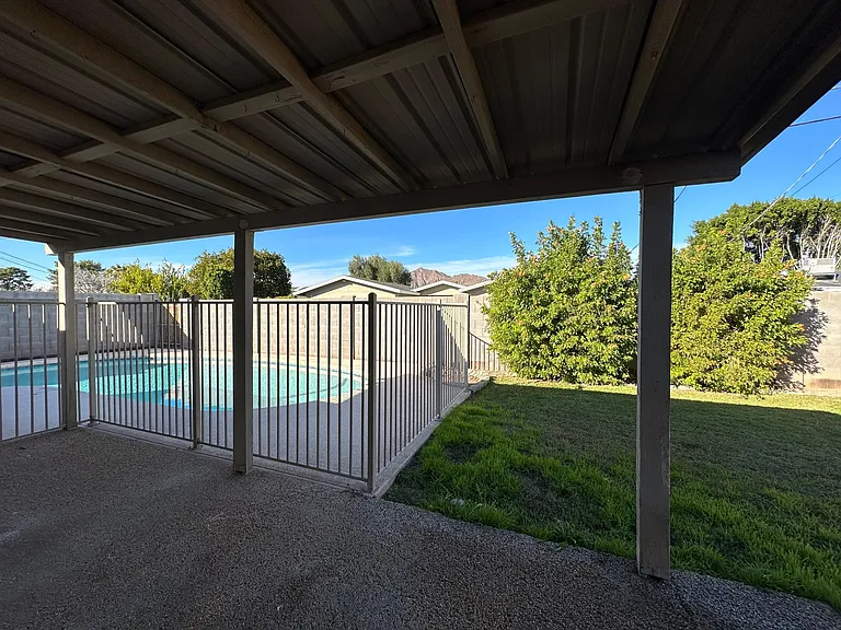 Shady, covered patio.
Safety fence and gate for pool