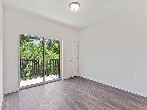 Spacious dining area with balcony access