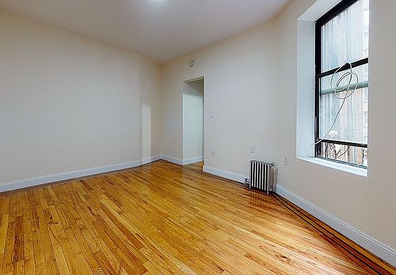 5th image of 229 E 12th St APT 24