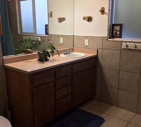 upstairs bathroom remodeled with tile and nice deep tub