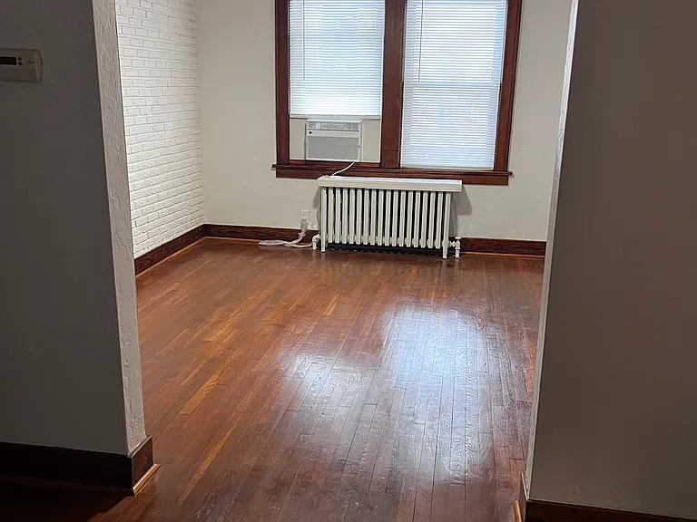 Dining-Livingroom with AirTight window 12000 BTU GE AC Installed