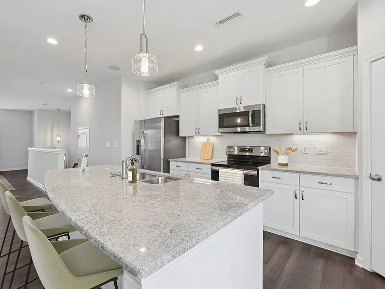 Upgrade Package Kitchen and dining area with hard-surface vinyl plank flooring