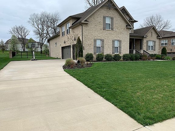 3 car garage and fenced yard