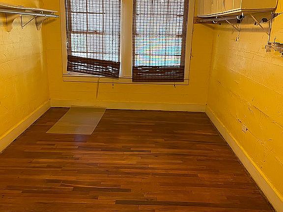 Bedroom with hardwood floor 