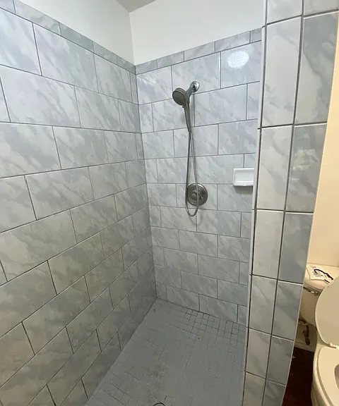 Recently tiled shower for master bedroom