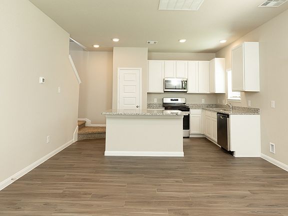 Family Room to Dining Area and Kitchen