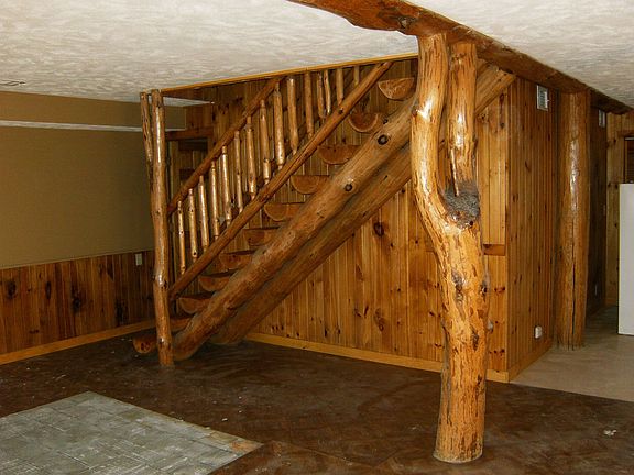 Walkout level family room with open stairway