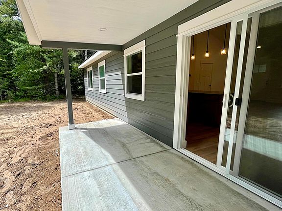 Covered patio. Does not show grass