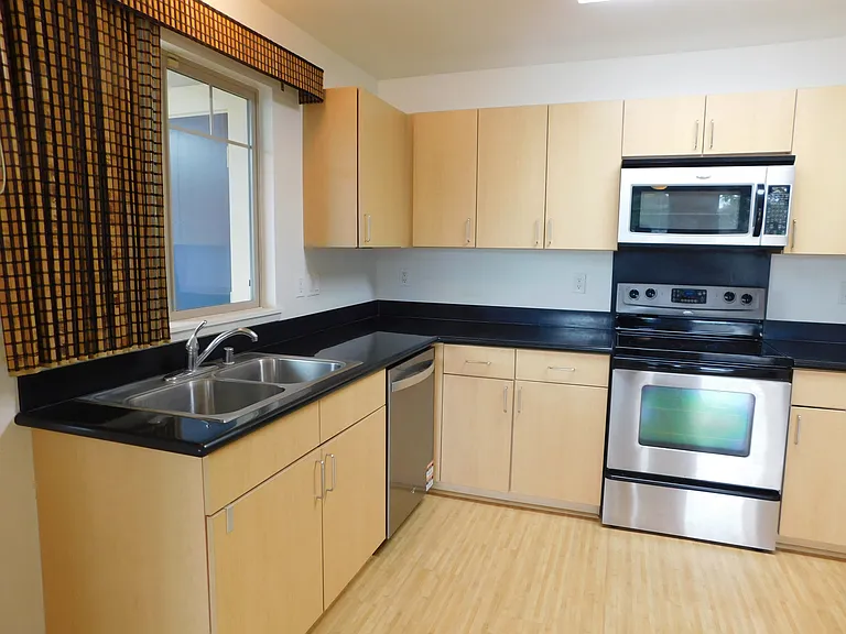 Kitchen window; dishwasher, range/oven; microwave/hood.