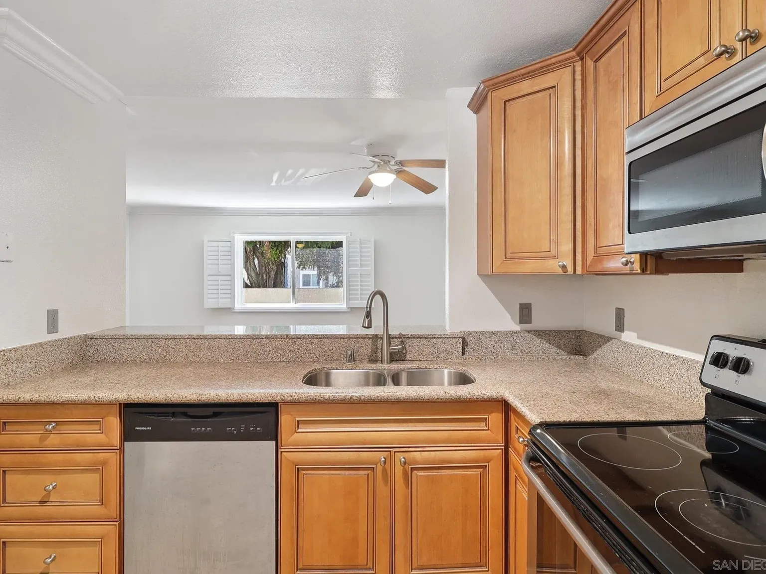 7565 Charmant Dr — Photo 2