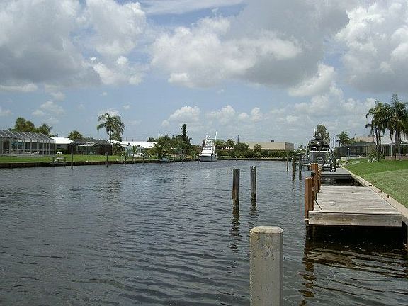 Home Has Deep Water Dock With Direct Access To The Intercoastal Way