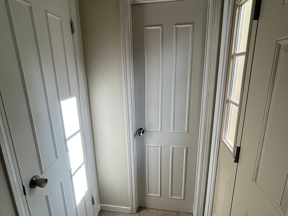 Storage to the left, half bath in the middle.