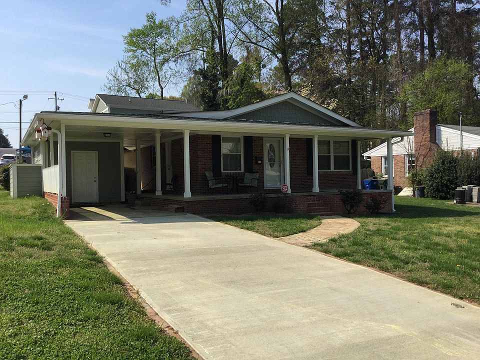 Beautiful front porch. Carport parking, new driveway.