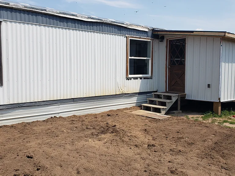 Front Entry
As you can see still working on yard.
It has a back entry as well.