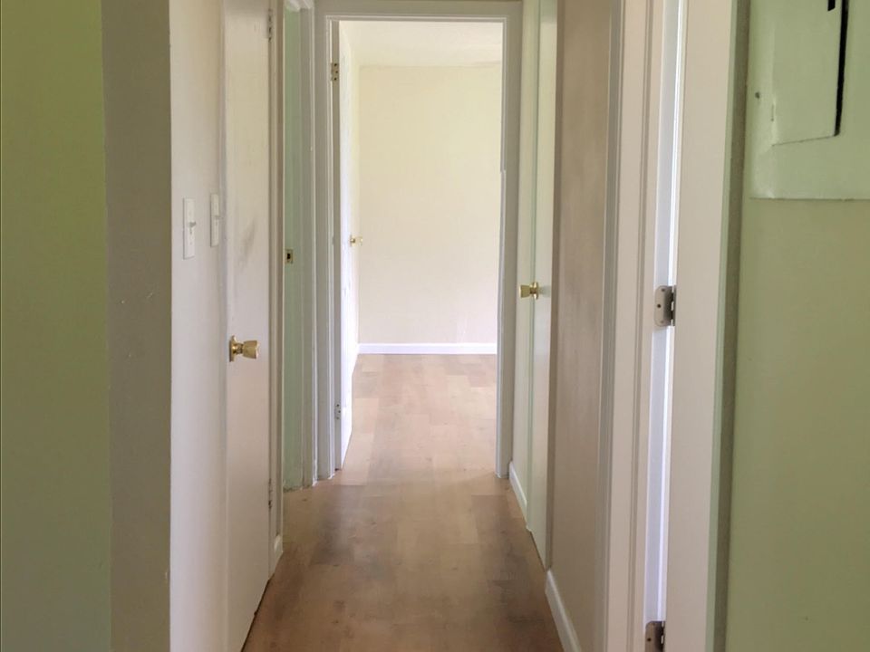 Hall to Guest Bathroom and Two Bedrooms