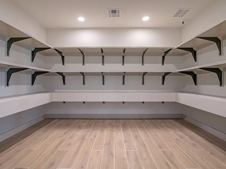 Elevate your storage game with this spacious, beautifully designed pantry at Sage at Celina Residences. Ample shelving provides flexibility and organization for all your culinary needs. Don't miss outschedule a tour today!