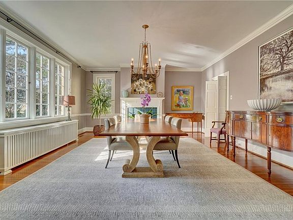 Elegant dining room. Refinished hardwood floors and Farrow & Ball paint throughout the home 