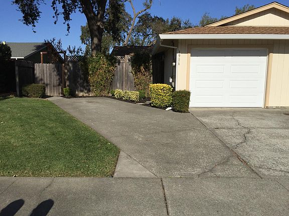 One Car Attached Garage, with Large Drive way with two additional parking spots