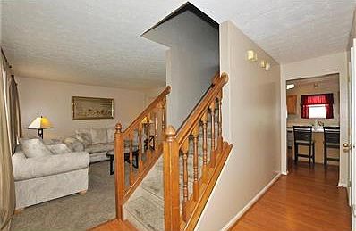 Open entry with fresh paint and newer flooring